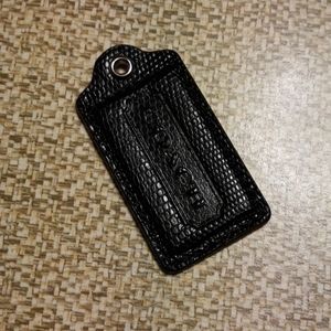 Crocodile embossed coach tag